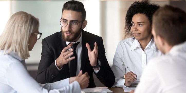 An AI product manager having a product strategy meeting.